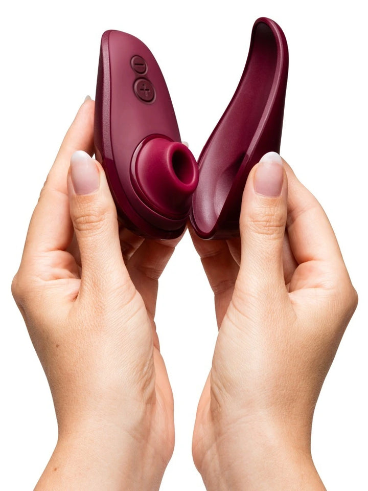 We-Vibe Sync Lite Paarvibrator in zwei Händen