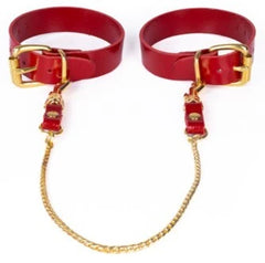 KinkySabine - Fußfesseln aus Leder mit Kette rot/gold