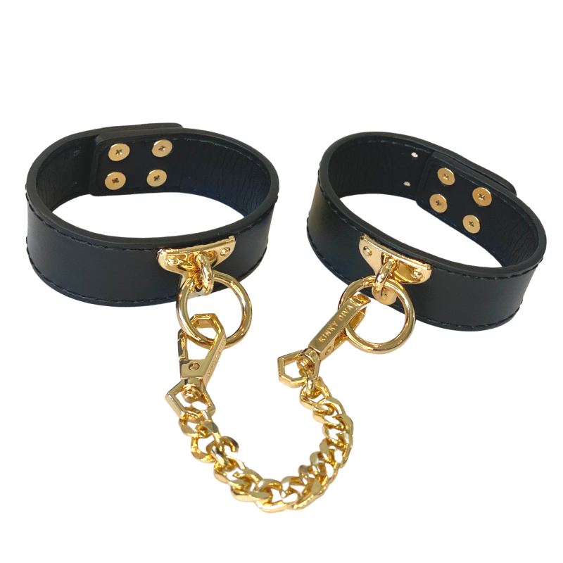 Kinky Diva Fußfesseln Schwarz/Gold – Styling