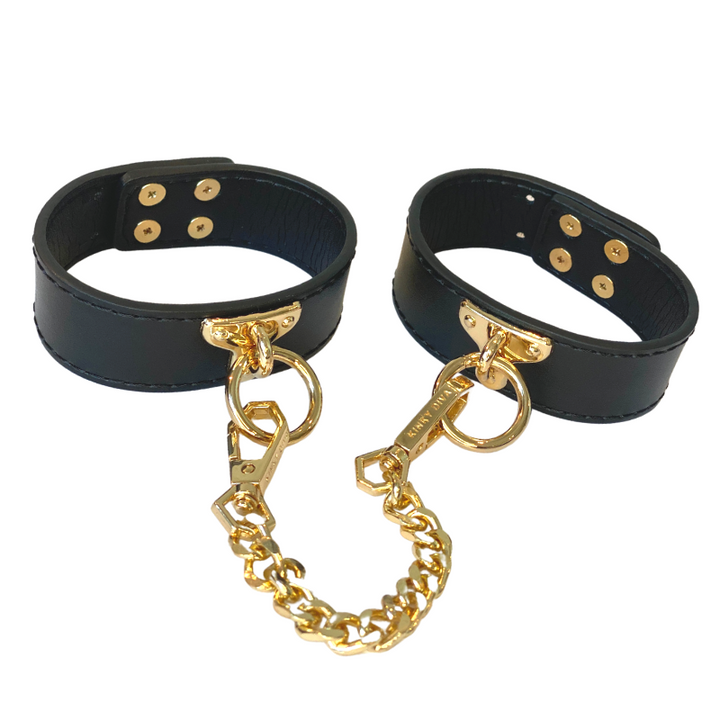 Kinky Diva Fußfesseln Schwarz/Gold – Styling