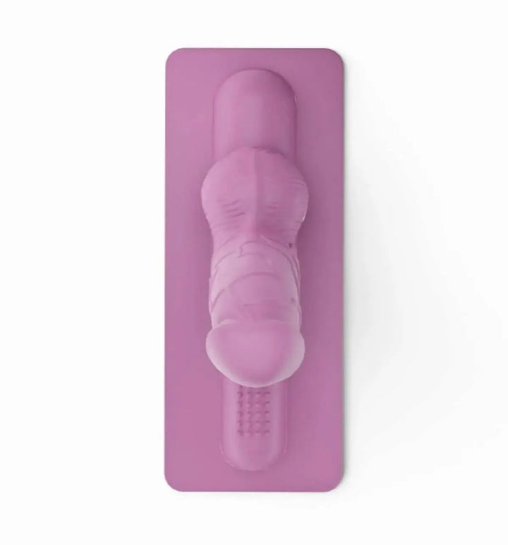 Motorbunny-Aufsatz My Friend Dick in zartem Pink, hochwertiges Silikon, realistisches Design auf elegantem Untergrund